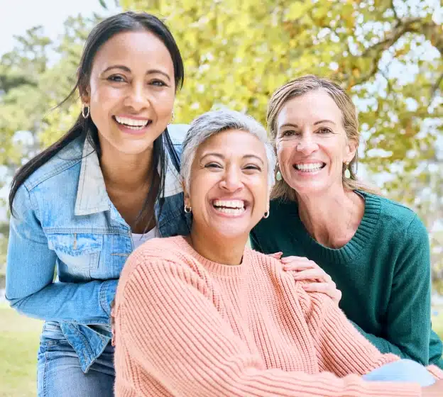 Group of smiling women representing diverse patients at North Frisco Dental & Orthodontics in Frisco, TX