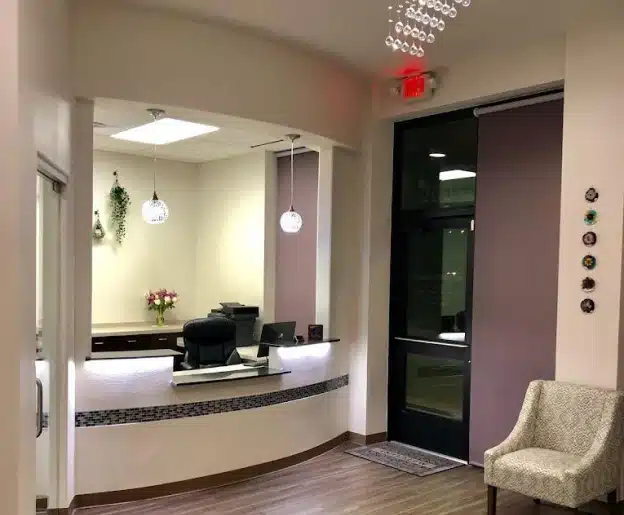 Front reception desk and check in area at North Frisco Dental & Orthodontics in Frisco, TX